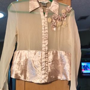 You’ll catch attention in this silk top classy